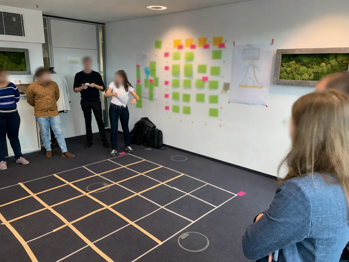 Practitioners mapping a complex organizational system during a workshop